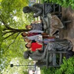Students visit the Susan B. Anthony and Frederick Douglass statue, Let's Have Tea, in Susan B Anthony Square