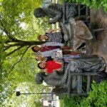 Students visit the Susan B. Anthony and Frederick Douglass statue, Let's Have Tea, in Susan B Anthony Square